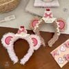 Bờm tai gấu caro nơ cherry