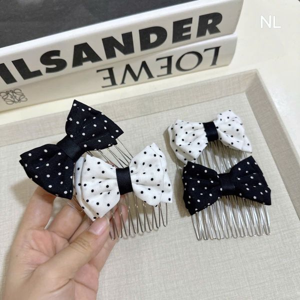 Xước nơ chấm bi đen trắng