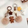 Móc khóa gấu cục lông nâu