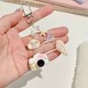 Móc khóa máy ảnh sò ốc