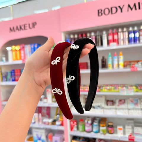 Cài xốp đỏ - đen bản lớn họa tiết nơ