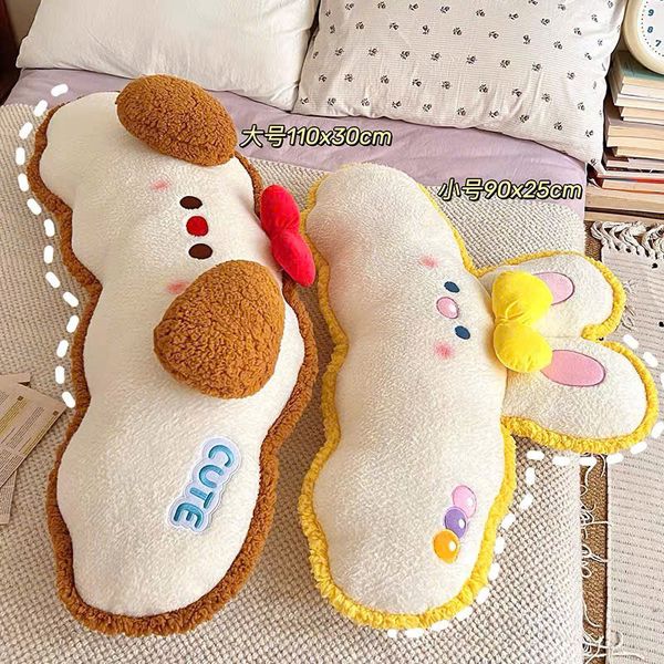Gối ôm mặt con vật đeo nơ