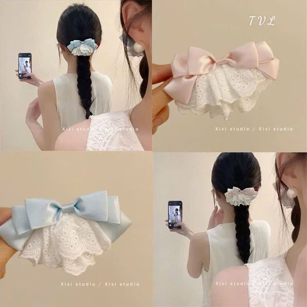 Kẹp nơ ren xoè xanh hồng