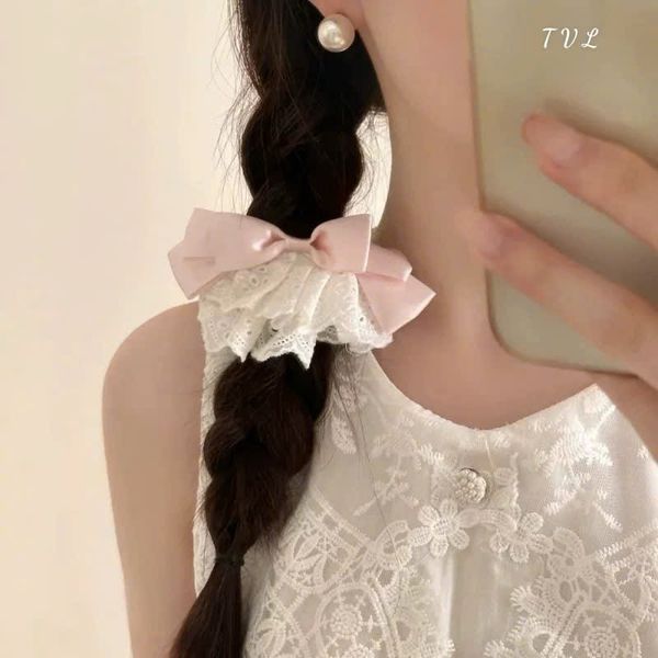 Kẹp nơ ren xoè xanh hồng