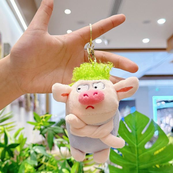 Móc khóa heo khoanh tay