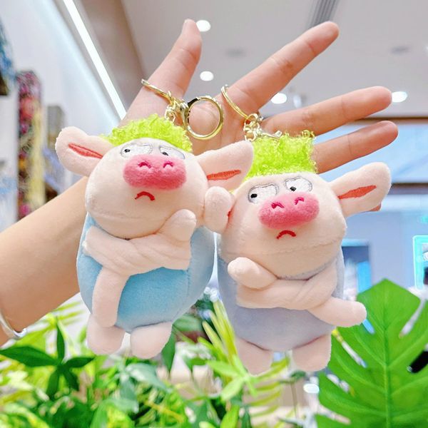 Móc khóa heo khoanh tay