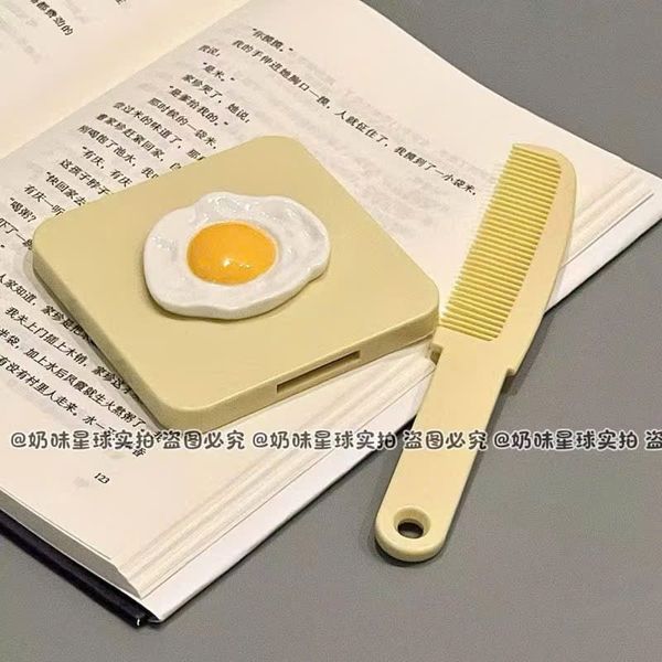 Gương lược cầm tay có cán - mã trứng + môi dày