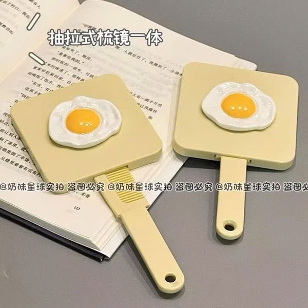 Gương lược cầm tay có cán - mã trứng + môi dày