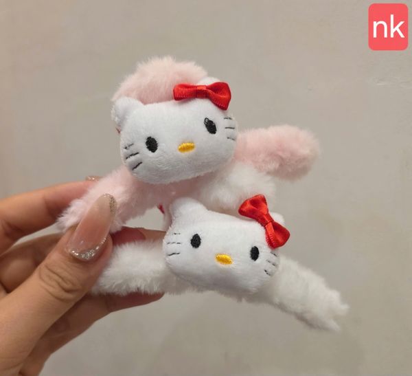 Cào lông đầu kitty