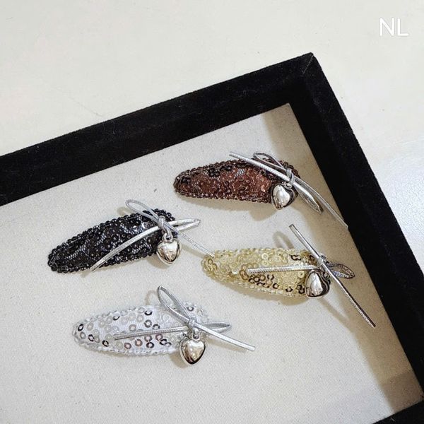 Vỉ 2 tách kim tuyến charm tim