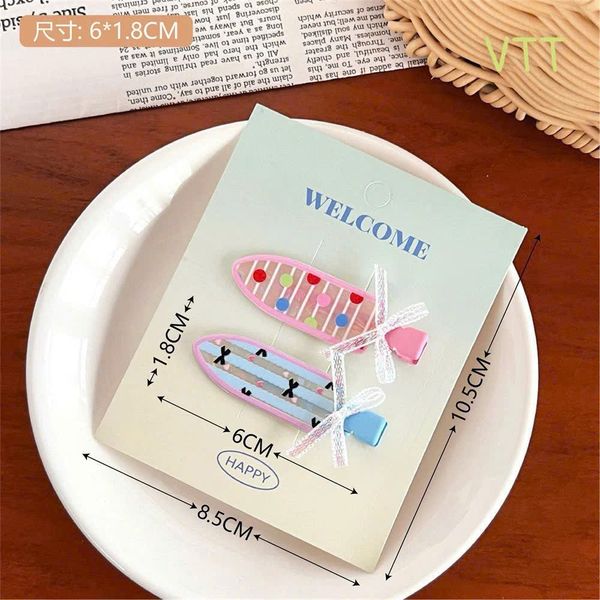 Kẹp dạng xẻng đính hoạ tiết