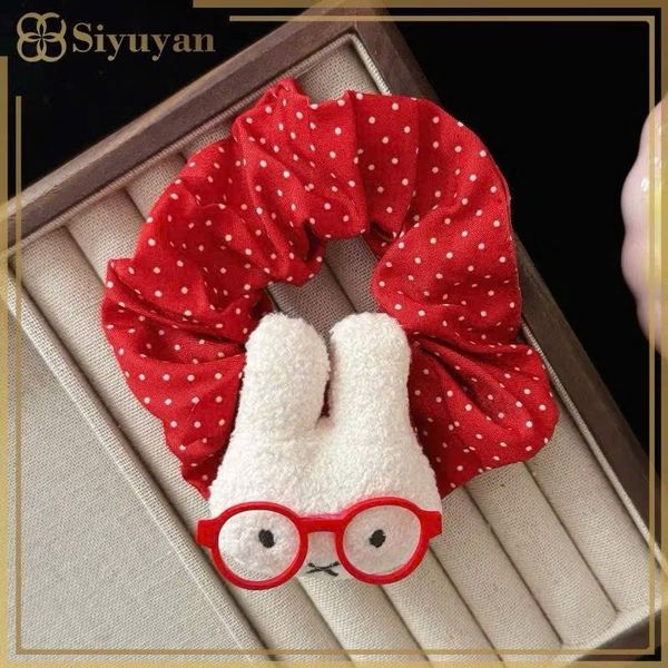 Scrunchies mèo đỏ đeo kính
