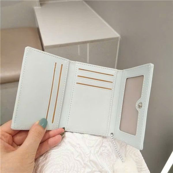 Ví gấp 2 thỏ nổi cục bông