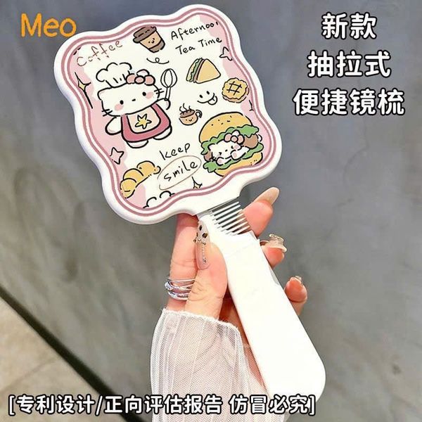 Gương cầm tay có lược kitty cat