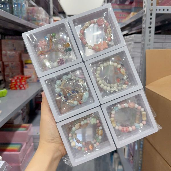 Vòng tay charm hộp đá đục