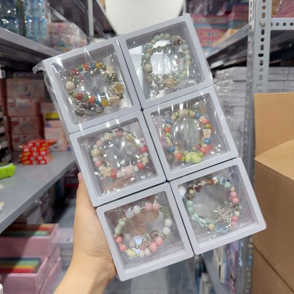 Vòng tay charm hộp đá đục