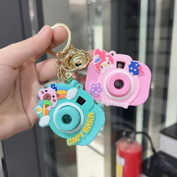 Móc khoá máy ảnh hoa