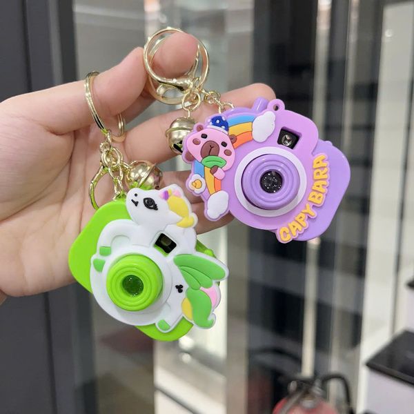 Móc khoá máy ảnh hoa