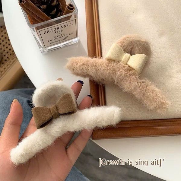 Cào lông charm nơ