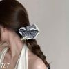 Scrunchies caro trắng đen viền bèo đính 3 nơ