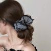 Scrunchies caro trắng đen viền bèo đính 3 nơ