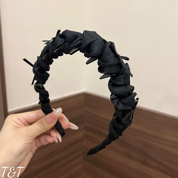 Xược cuốn vải đính nơ nâu đen