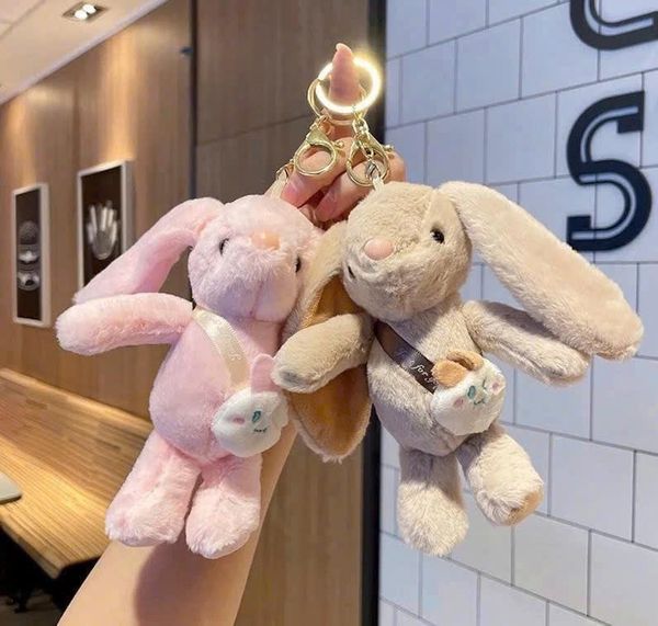 Móc khóa bông thỏ đeo balo