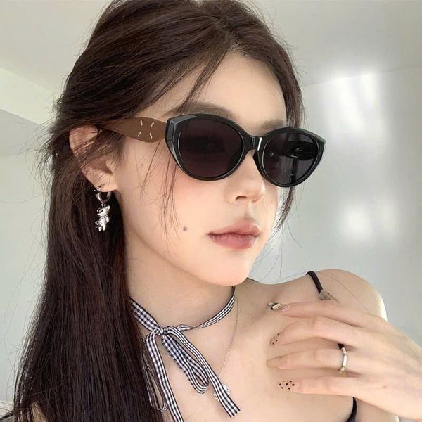 Kinh râm gọng nâu gỗ