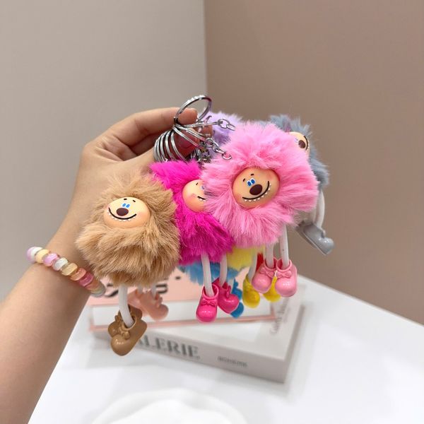 Móc khoá cục bông 2 mắt