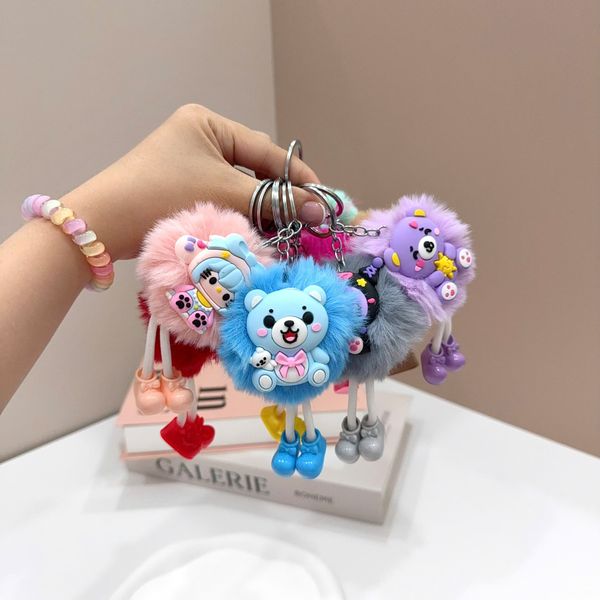 Móc khoá cục bông 2 mắt