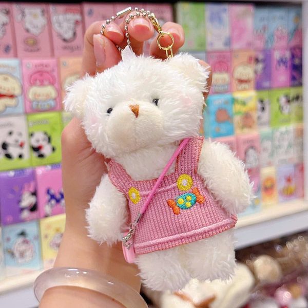 Móc khóa gấu trắng đeo mấy ảnh