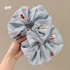 Scrunchies kẻ xanh cherry