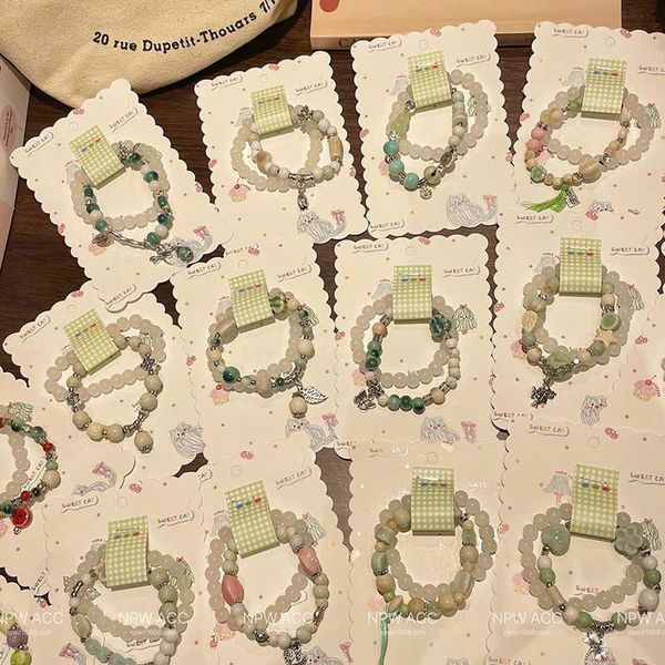 Set 2 lắc tay tone xanh lá