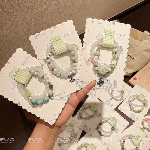 Set 2 lắc tay tone xanh lá