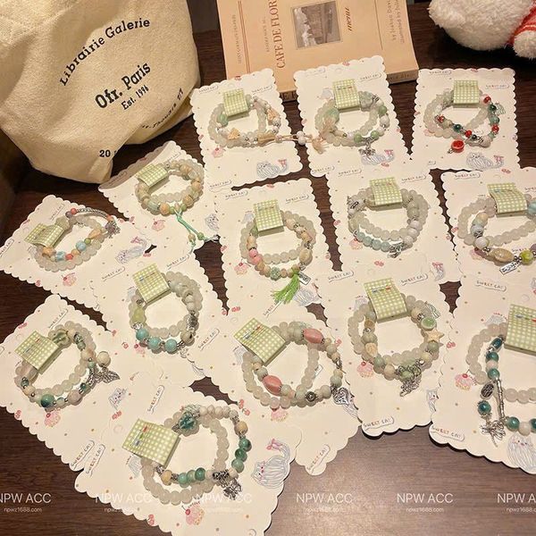 Set 2 lắc tay tone xanh lá