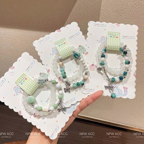 Set 2 lắc tay tone xanh lá