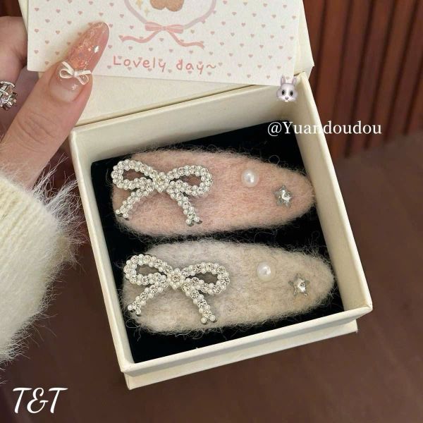 1 chiếc Tách lông charm nơ đá