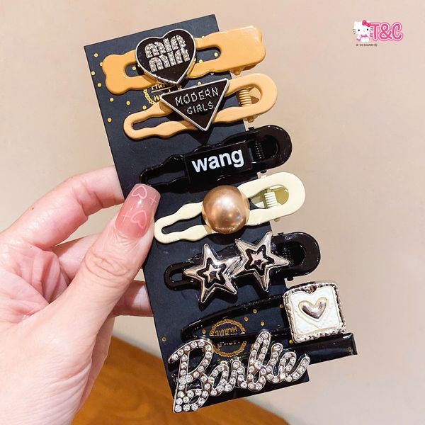 Vỉ 6-7 kẹp charm hiệu ( vỉ đen )