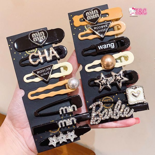 Vỉ 6-7 kẹp charm hiệu ( vỉ đen )