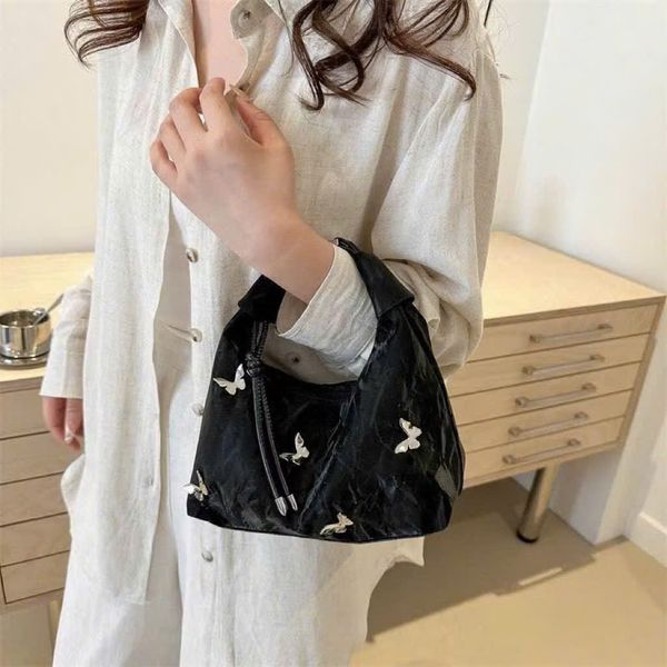 Túi xách họa tiết bướm