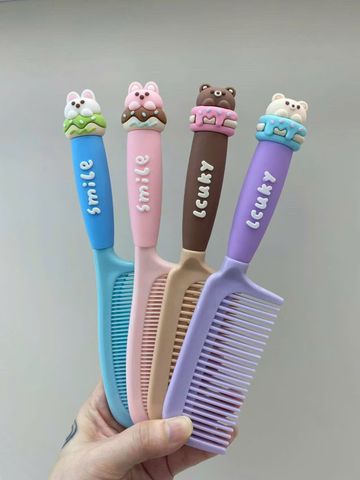Lược nhựa kute có hộp