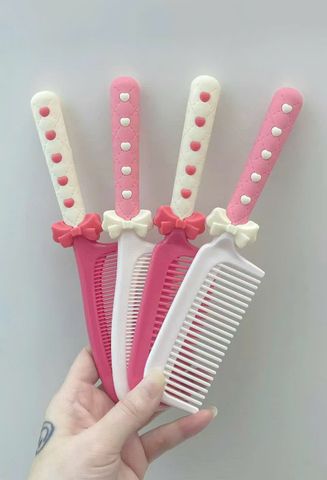 Lược nhựa kute có hộp