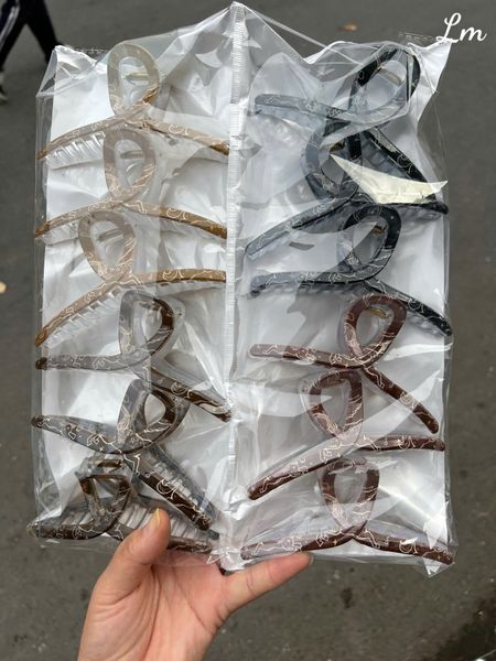Cào tóc in chấm nơ