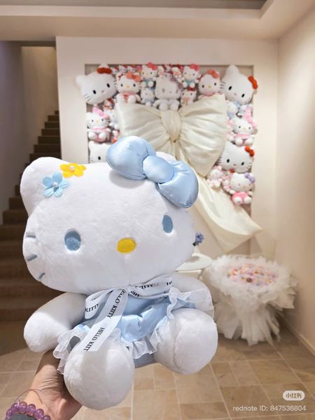 Hello kitty váy xanh đeo nơ xanh 45cm