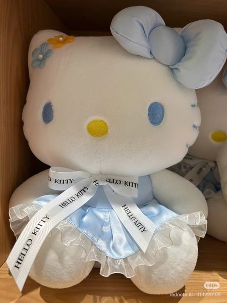 Hello kitty váy xanh đeo nơ xanh 45cm
