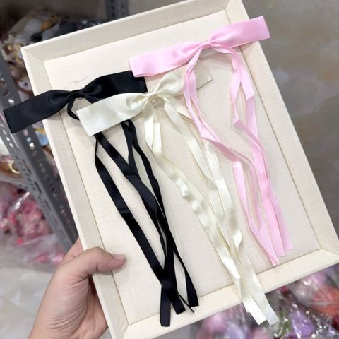 Kẹp trơn nơ dài tua rua