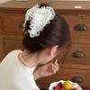 Cào tam giác trắng đen có ren nơ đen