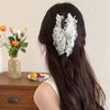 Cào tam giác trắng đen có ren nơ đen