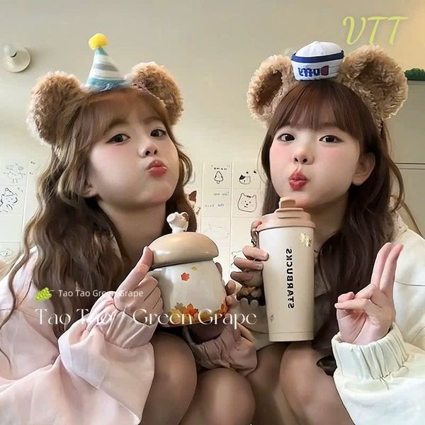 Cài tai  gấu nâu xù mũ sinh nhật