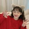 Cài gấu xù nơ chuông